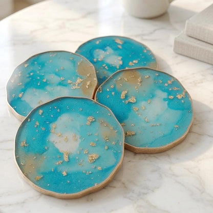 Turquoise and gold leaf epoxy resin coasters with gilded edge