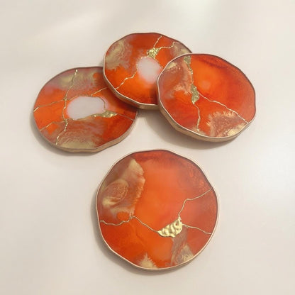 Valencia orange kintsugi epoxy coasters with natural edge and gold