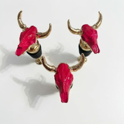 Pink longhorn skull wine stopper with gold horns for bar cart decor