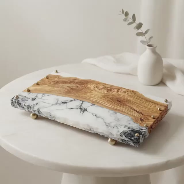 Load video: Italian Olive wood and epoxy resin tray with solid brass accents and feet.